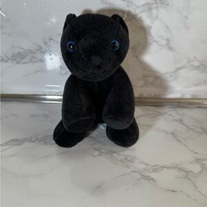 Black Plush Toy with Blue Eyes